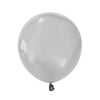 A single, round, matte white latex balloon tied at the neck.