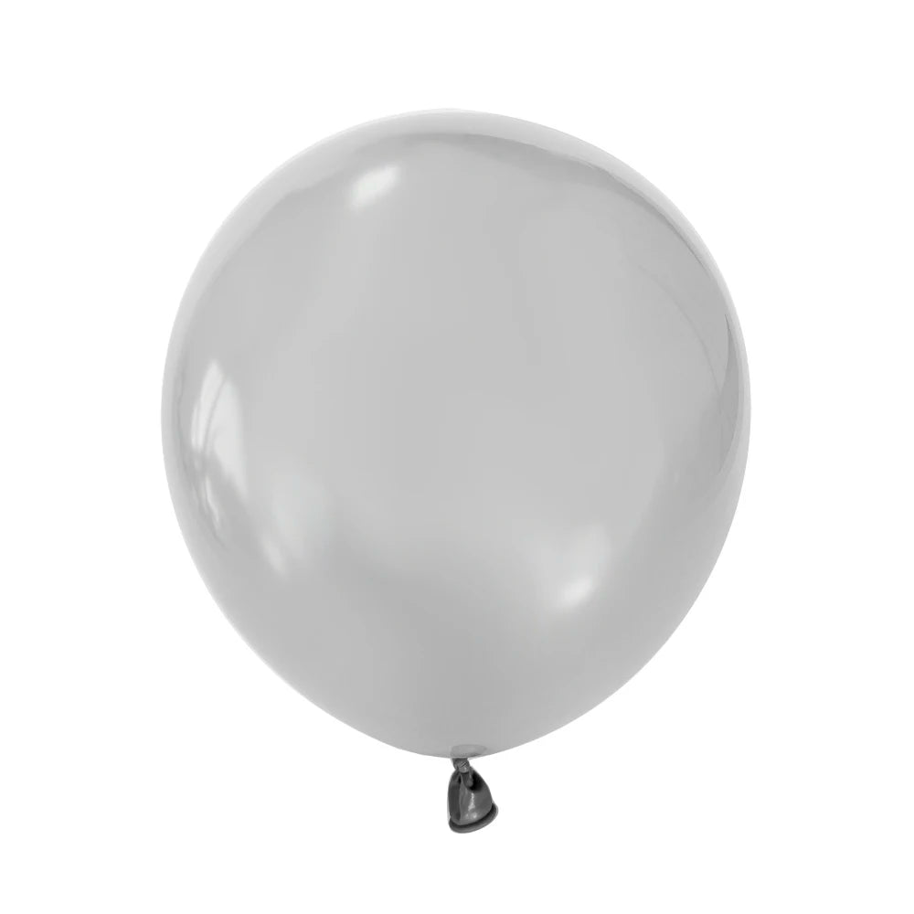 A single, round, matte white latex balloon tied at the neck.