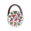 A silver-toned handbag hook with a floral crystal design.