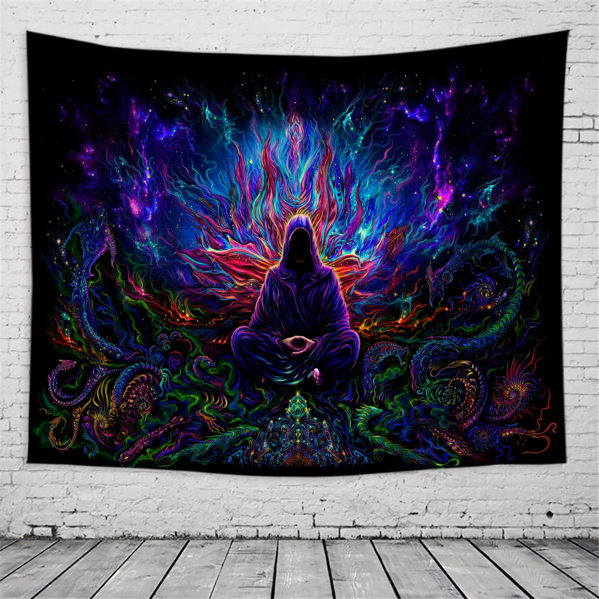 A dark tapestry featuring a silhouette of a meditating figure surrounded by vibrant, glowing purple and blue cosmic energy.