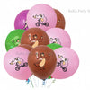 A balloon bouquet featuring pink, purple, and green balloons decorated with a white silhouette of Masha and Bear riding a bic