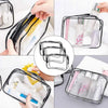A transparent waterproof toiletry bag with a zipper is shown being used to organize various personal care items.