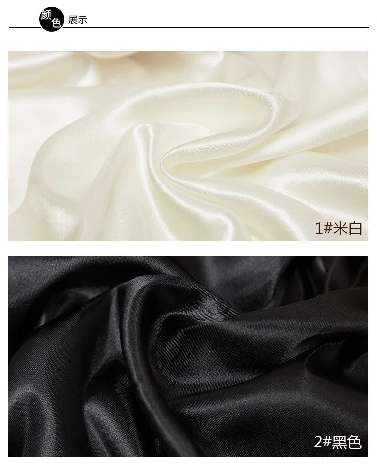 Two swatches of satin fabric are shown: one in off-white and one in black.
