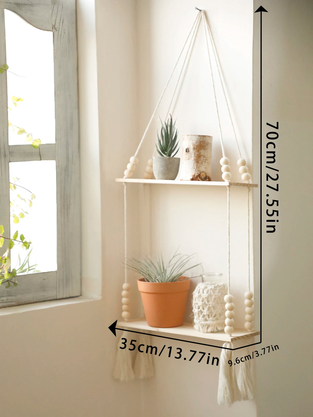 A rustic wooden wall shelf with macrame hangers displaying potted plants and decorative items.