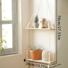 A rustic wooden wall shelf with macrame hangers displaying potted plants and decorative items.