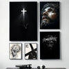 A set of four black framed canvas prints featuring abstract art and a cross design.