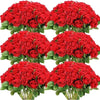 A bouquet of artificial silk red roses arranged for table decor.