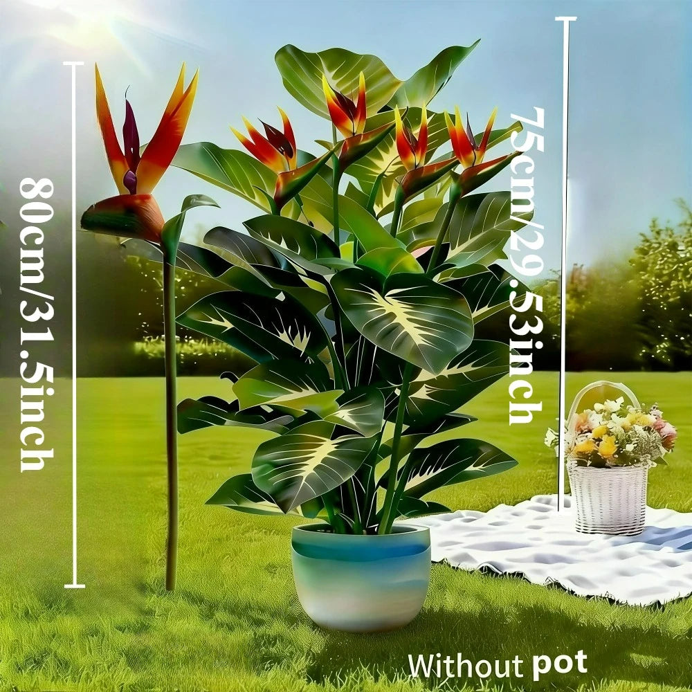 Artificial Bird of Paradise and Pothos plants displayed in a pot on grass with height measurements.
