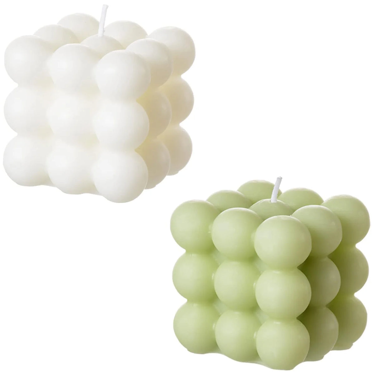 A set of two white and pink cube soy wax candles