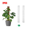 Two plastic moss pole plant supports with a green plant and a small green piece
