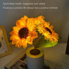 A bright yellow sunflower night light illuminates a dark room, symbolizing health and happiness.
