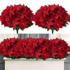 A bouquet of realistic artificial red poinsettia flowers for holiday decoration.
