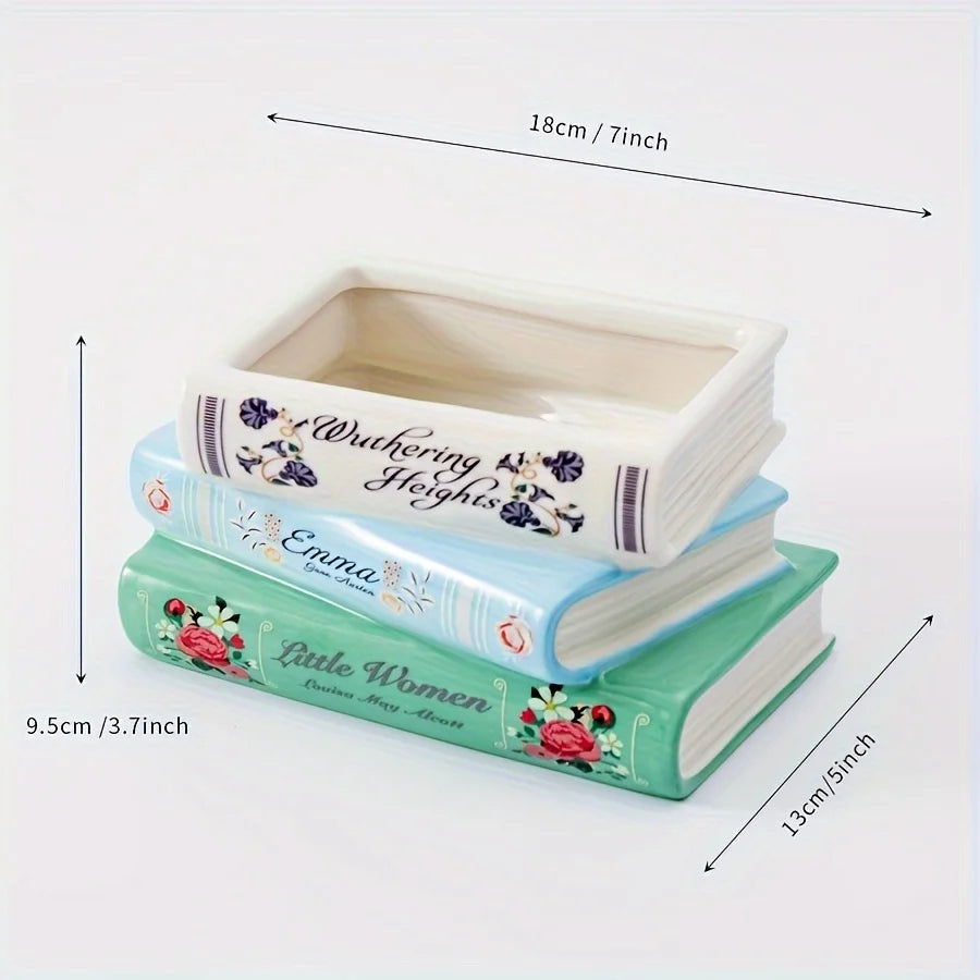 Vase en céramique à trois couches en forme de livre avec couvercle et motifs floraux décoratifs.