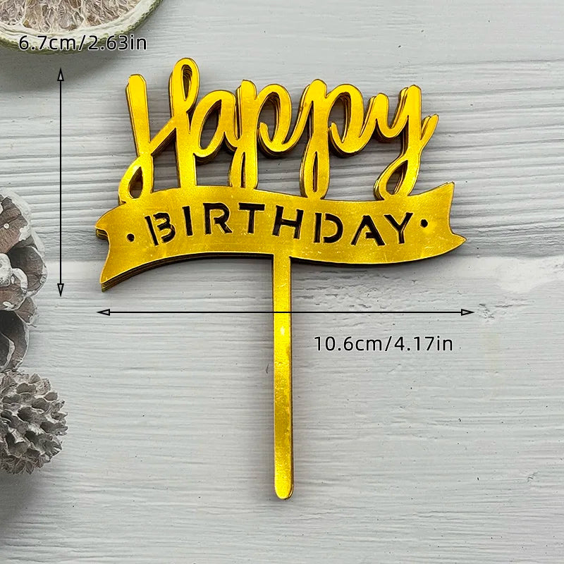 Gold acrylic birthday cake topper with the words Happy Birthday on a wooden stick