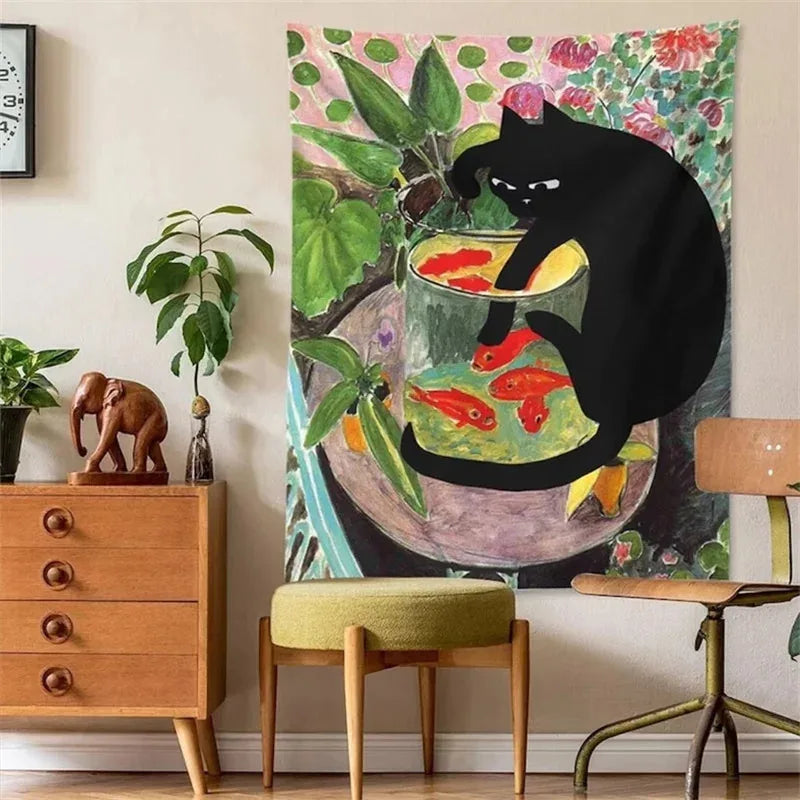 A tapestry featuring a black cat sitting on a goldfish in a glass bowl against a vibrant green and pink floral background.