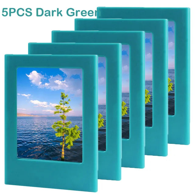 Five dark green magnetic photo frames displaying a scenic landscape.