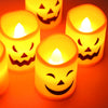 A set of six battery-powered LED Halloween candles with flickering flames glowing in orange light.