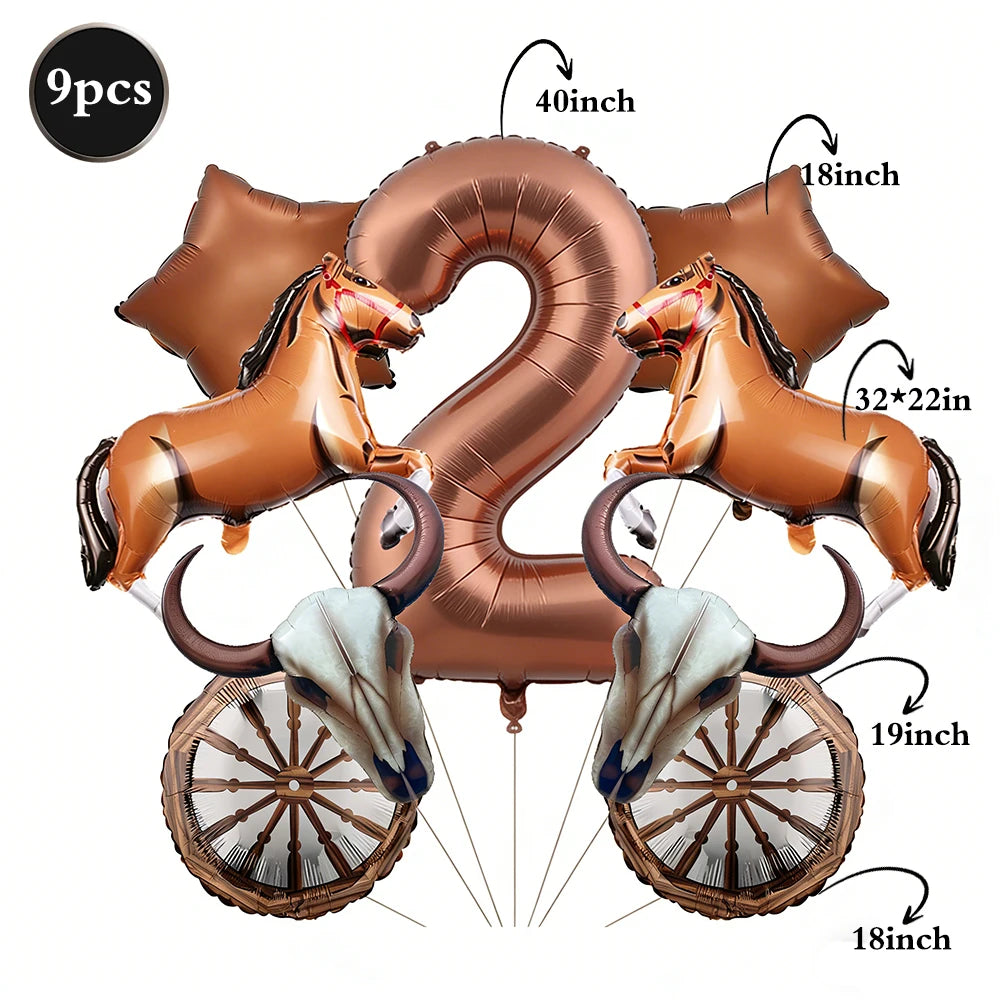 A set of foil balloons shaped like the number 2 and two horses, in a bronze or copper color.