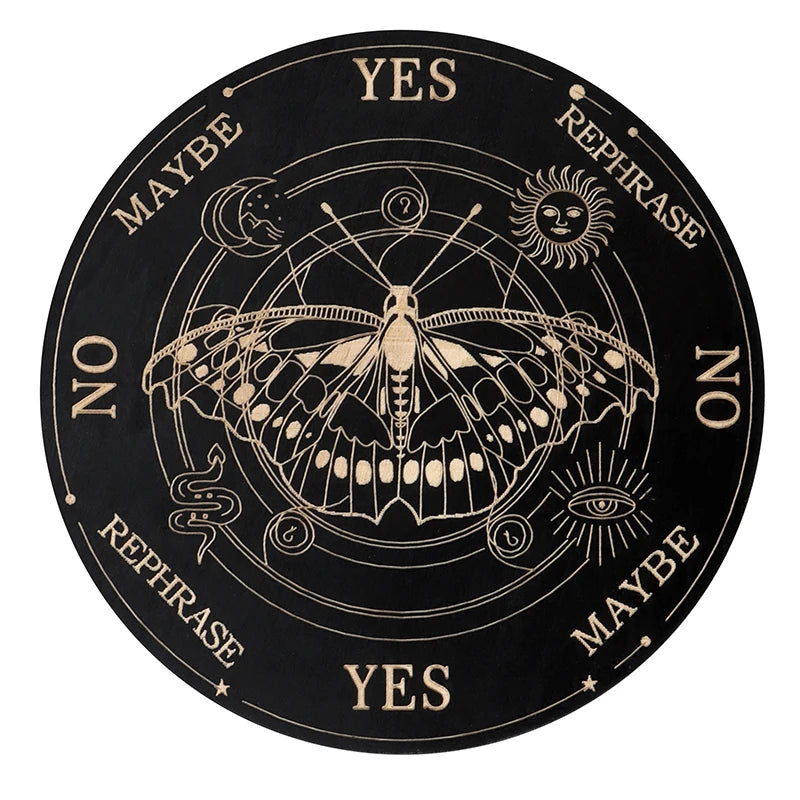 A circular wooden divination board with eight sections labeled YES, MAYBE, NO, REPHRASE, and a central butterfly design.