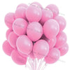 A cluster of matte pink balloons forming a party store garland set.