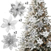 A set of six glittered artificial white flowers with clips displayed next to a decorated Christmas tree.