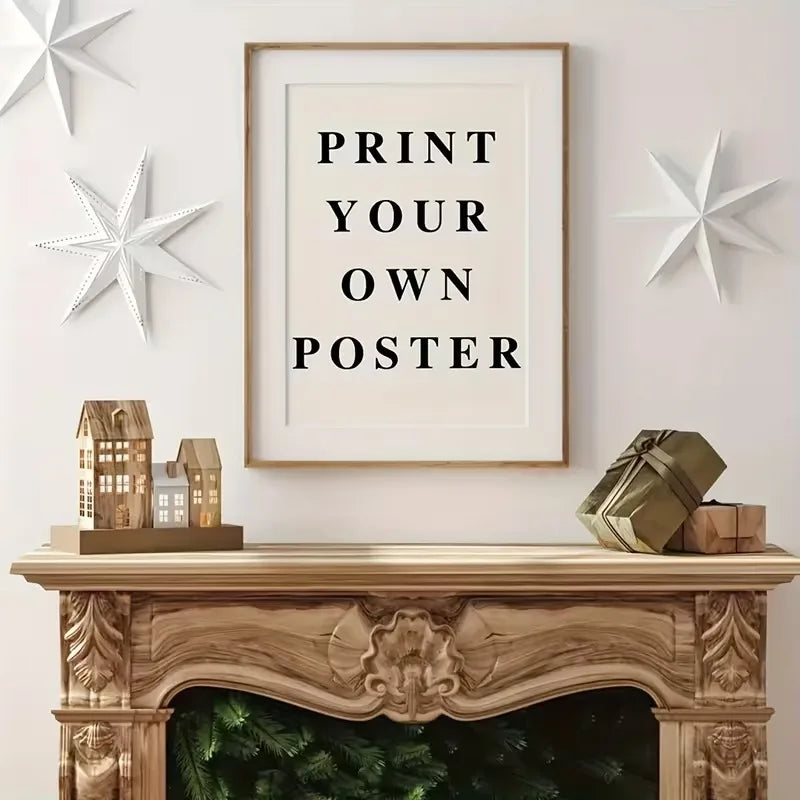A framed print with the text PRINT YOUR OWN POSTER on a white background displayed above a wooden mantelpiece.