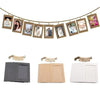 A set of rustic wooden clip photo display frames with kraft paper inserts.