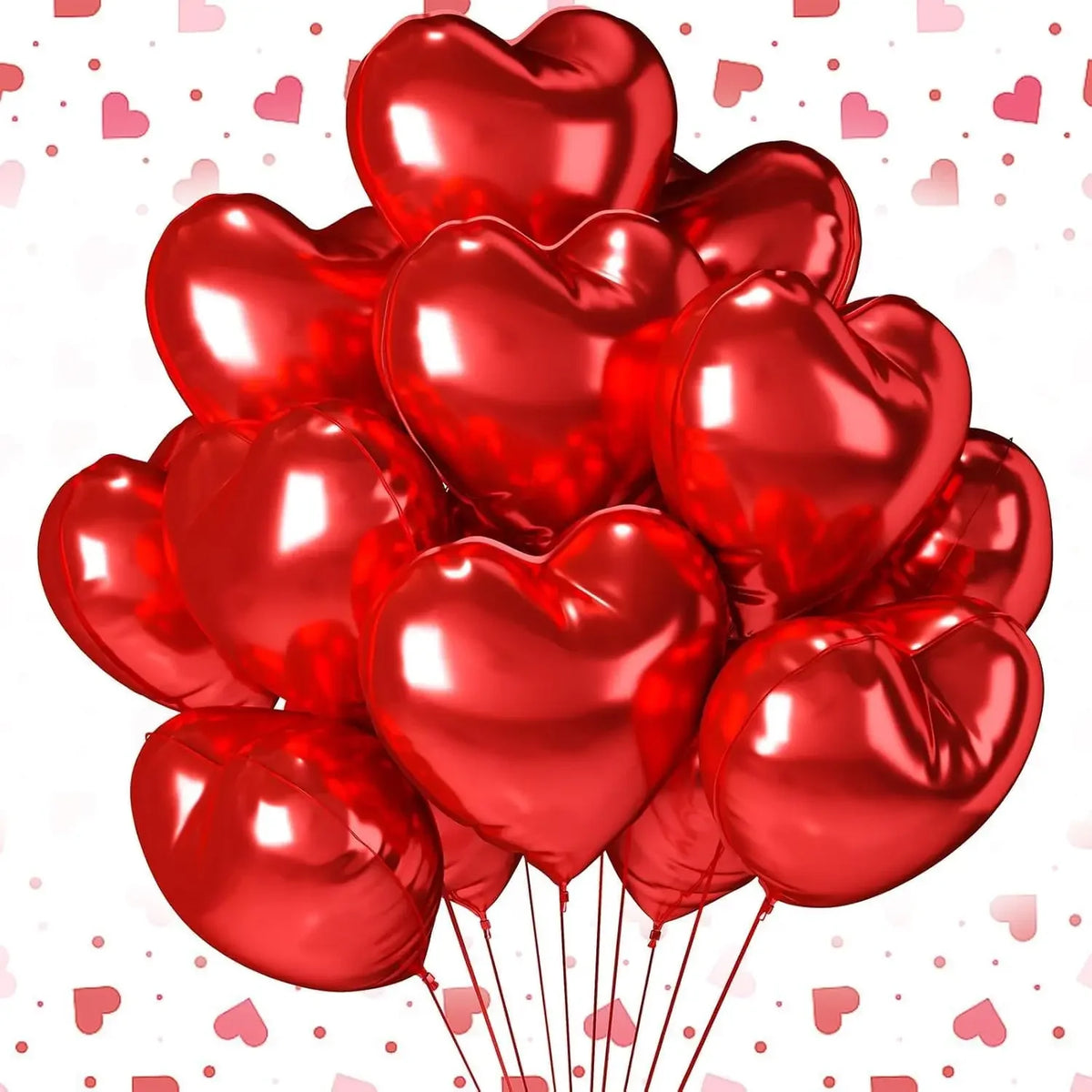 A cluster of shiny red heart-shaped latex balloons scattered on a white background.