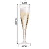 A tall, clear plastic champagne flute with a long stem and a wide bowl.