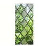 A close-up view of a retro European green leaf privacy window film with a diamond pattern.