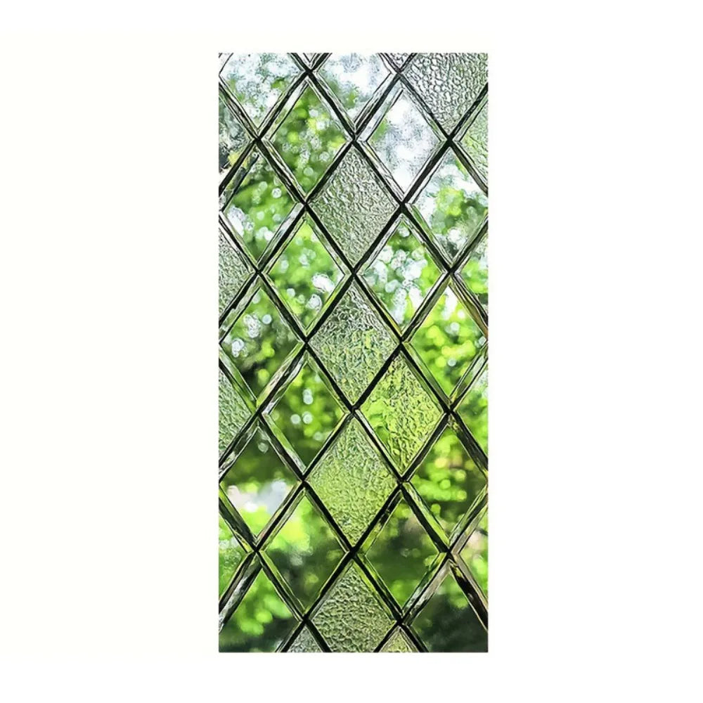 A close-up view of a retro European green leaf privacy window film with a diamond pattern.