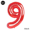A red inflatable number 9 shaped like a spider web for party supplies.
