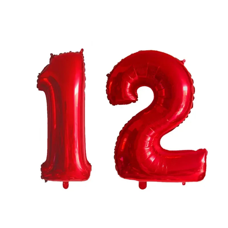 Red helium foil number balloons shaped like the number 12
