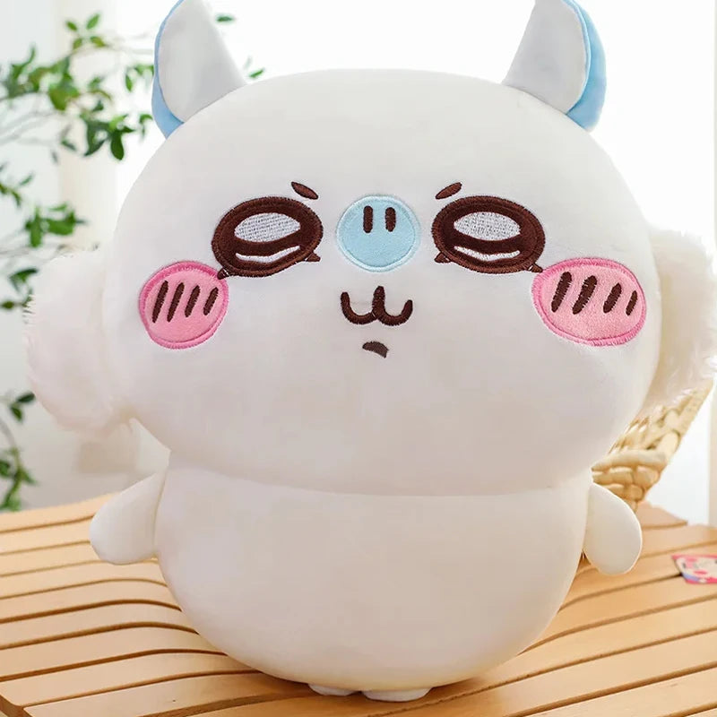 A white Chiikawa Hachiware plush pillow with large ears and expressive eyes.