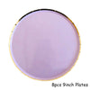 Eight 9-inch plates with a purple and gold rim for party tableware.