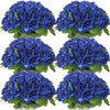 A bouquet of deep blue velvet artificial roses, arranged in clusters.