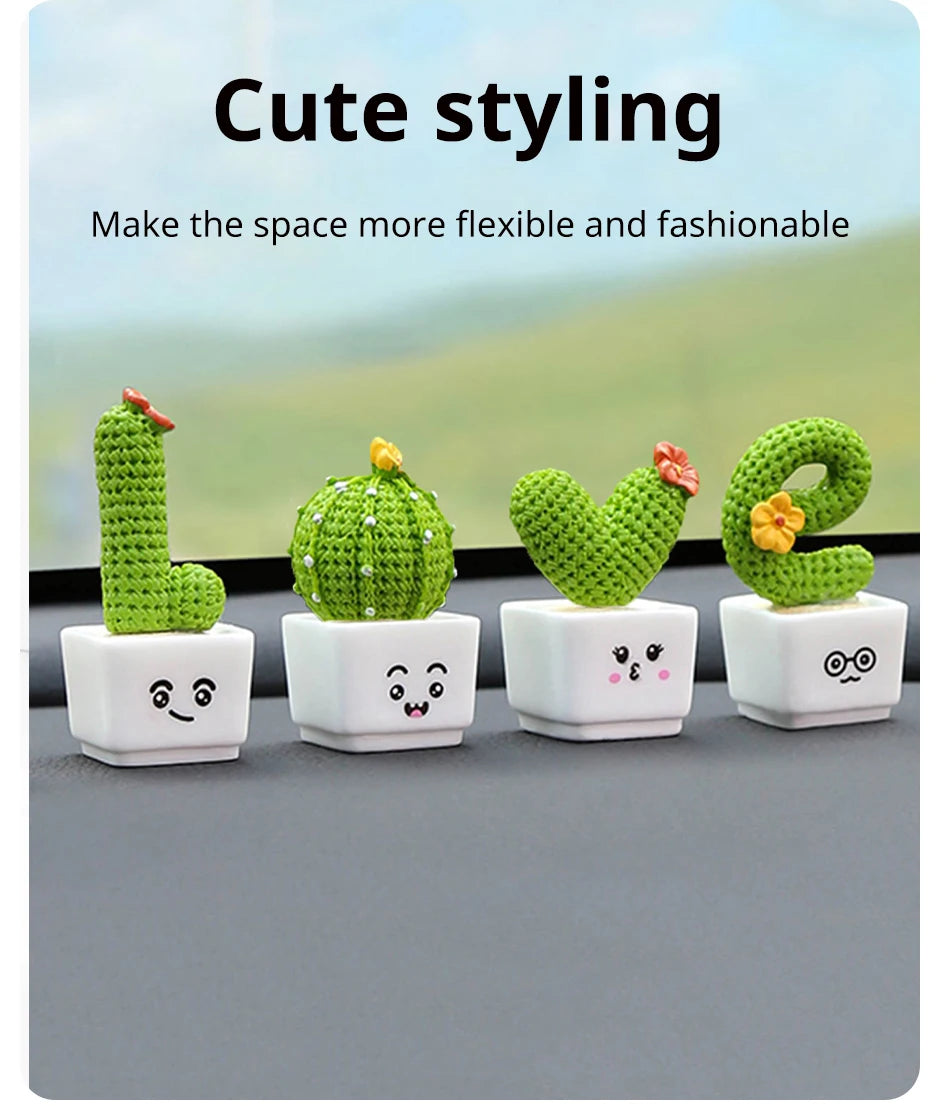 A set of four green resin succulent cacti in various shapes and colors displayed on a gray surface.
