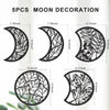 Five pieces of black wooden moon decoration featuring various leaf and botanical patterns for wall art