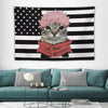 A tapestry featuring a cat with pink hair against an American flag background.