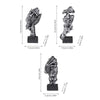 A set of three resin figurines depicting figures shrouded in cloth, displayed with measurement lines.