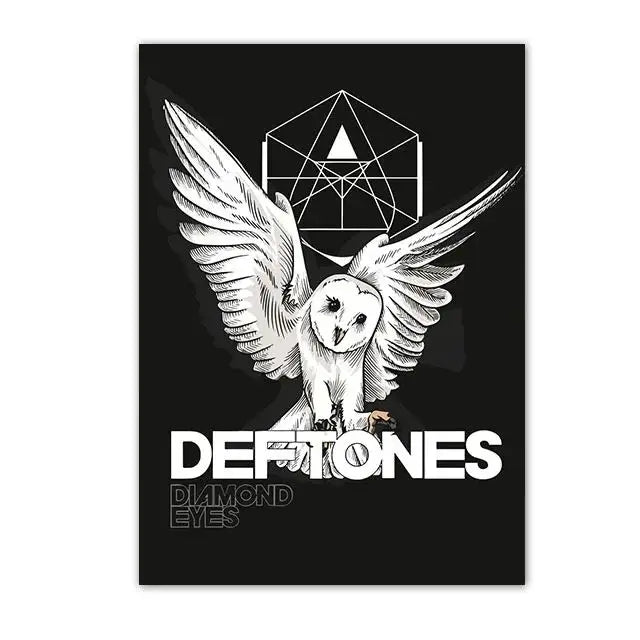 A black and white graphic featuring a stylized eagle with wings and a geometric shape, with the text DEFTONES DIAMOND EYES.