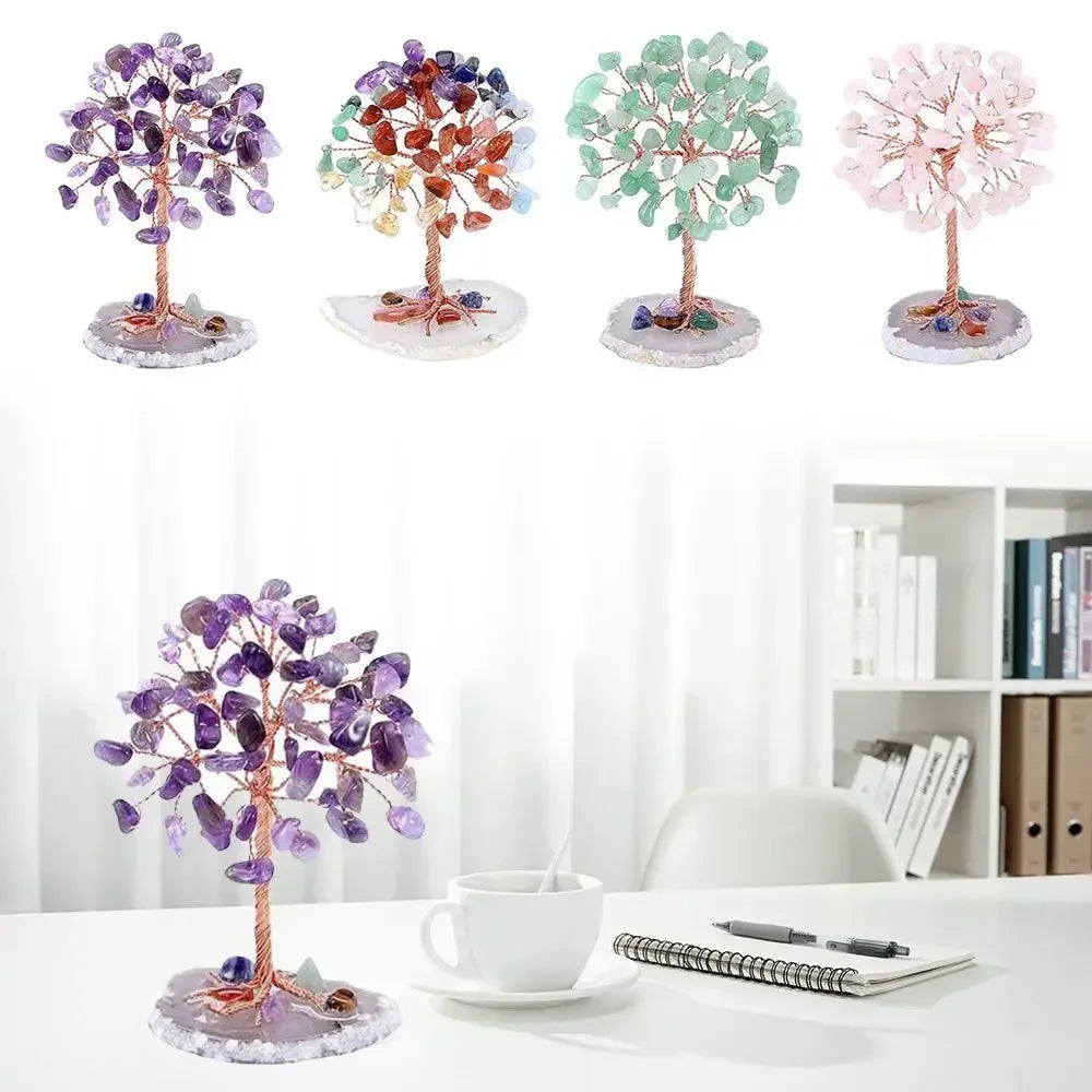 A collection of four crystal money tree decor plants in various shades of purple, green, and pink on a white background.