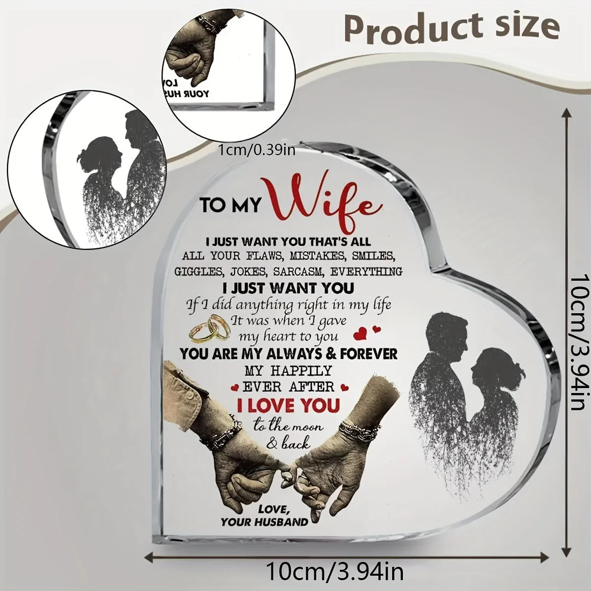 A heart-shaped acrylic decoration featuring silhouettes of a couple's hands and figures with romantic text