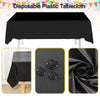 Black disposable plastic tablecloth shown in various forms including a draped cloth and a folded square.
