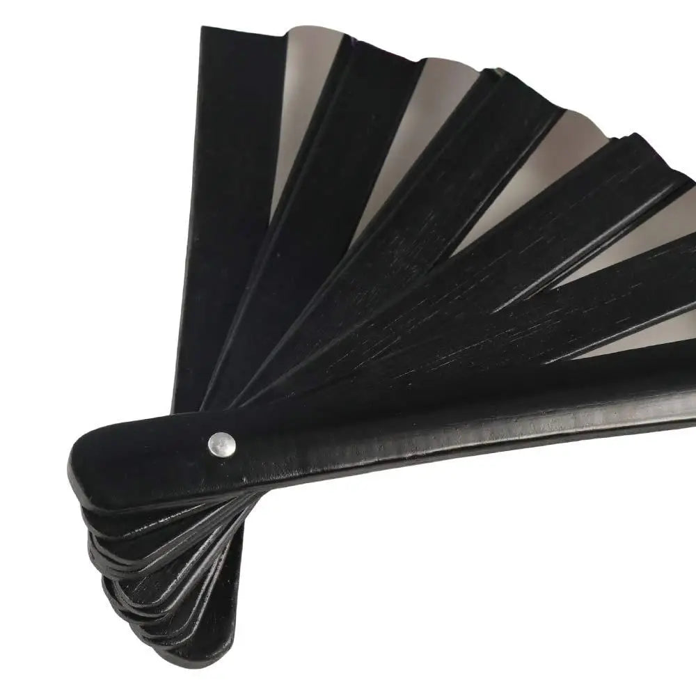 Black folding hand fan with UV fluorescent blades shown from the side.