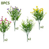 Eight pieces of faux floral plants featuring purple, yellow, and pink blossoms for outdoor decoration