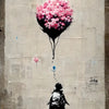 Banksy style canvas art featuring a pink floral balloon floating against a gray wall with a silhouette of a person below.