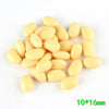 A pile of pale yellow resin fake corn miniatures, 10 pieces, 16mm long.