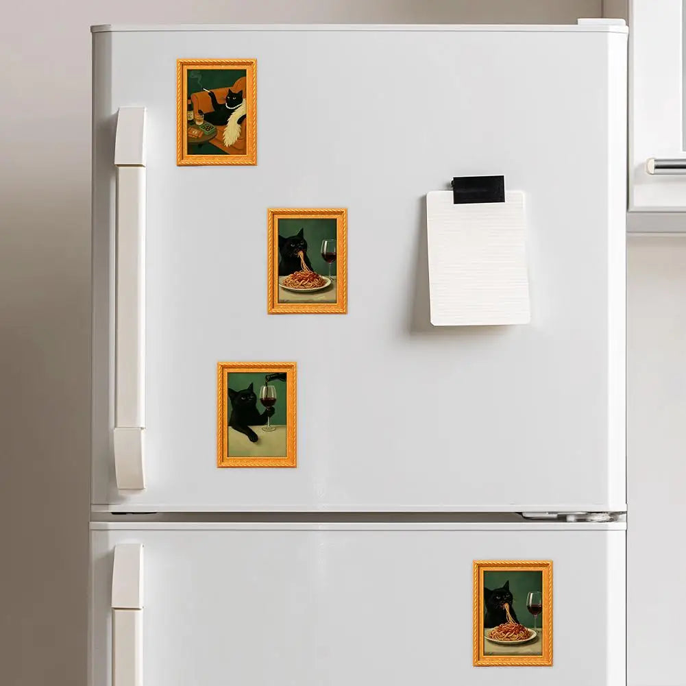 A white refrigerator decorated with several framed wooden magnets featuring artwork of a black cat eating food.