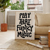 A framed black text art poster on a white background that reads PLAY THAT FUNKY MUSIC, displayed indoors.